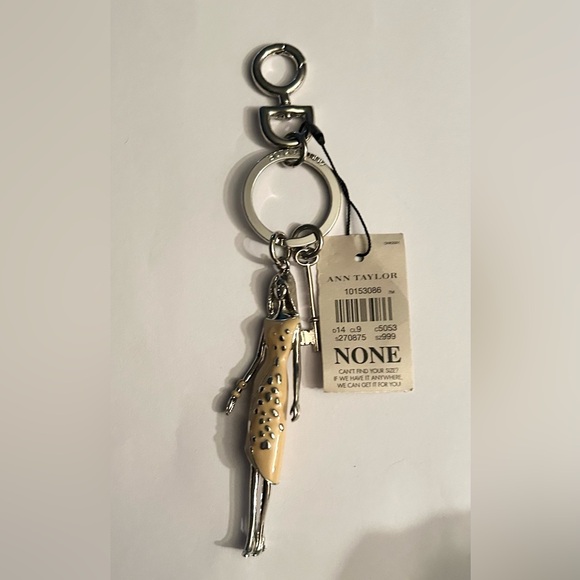 Ann Taylor Accessories - Ann Taylor Silver Tone Keychain with Yellow Enamel Woman Charm